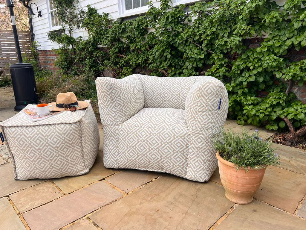 garden bean bag armchair in natural sigma with matching pouffee. 100% british-made, stain-proof, water-resistant with 5 year guarantee