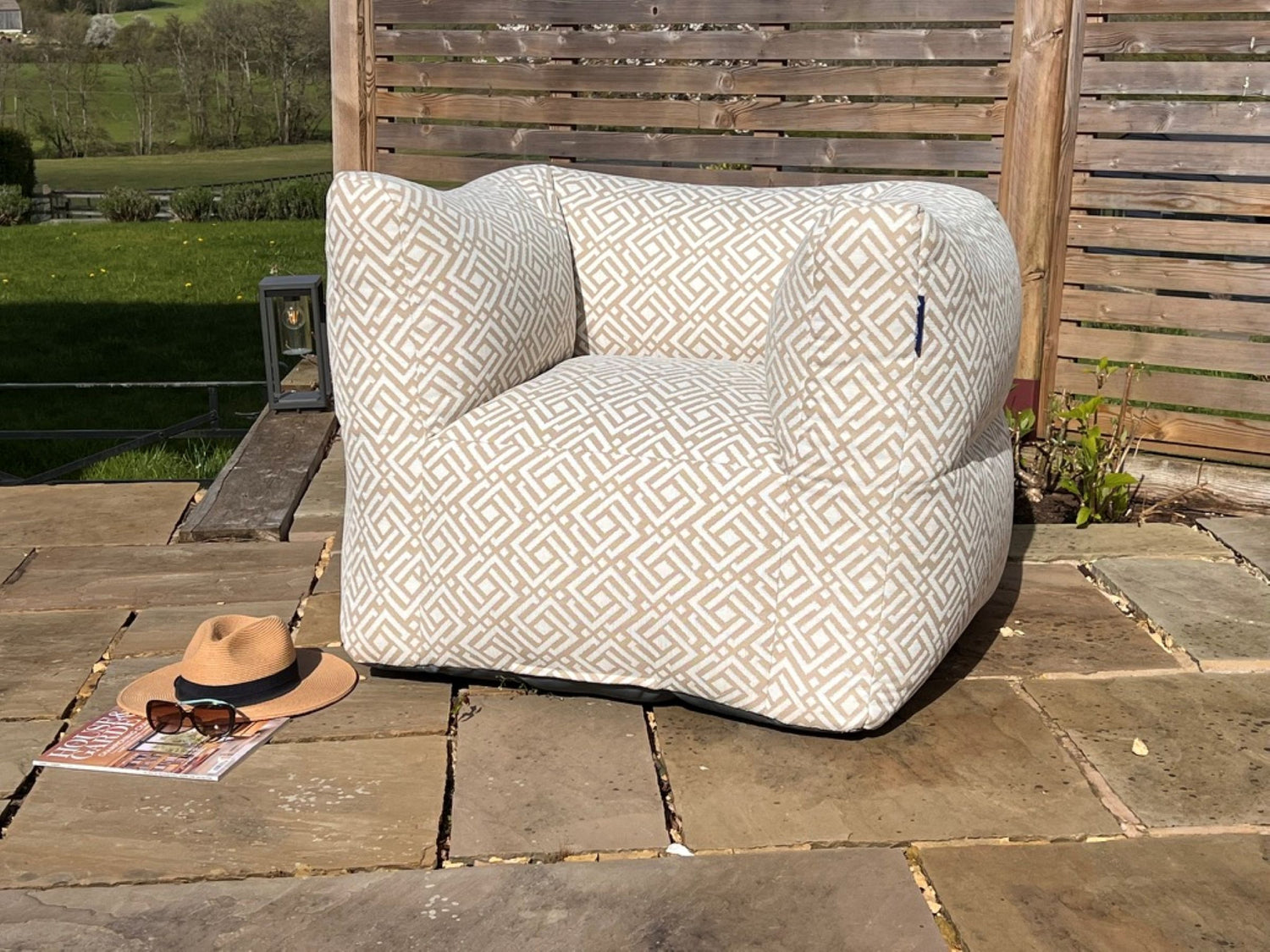garden bean bag armchair in natural sigma. 100% british-made, stain-proof, water-resistant with 5 year guarantee