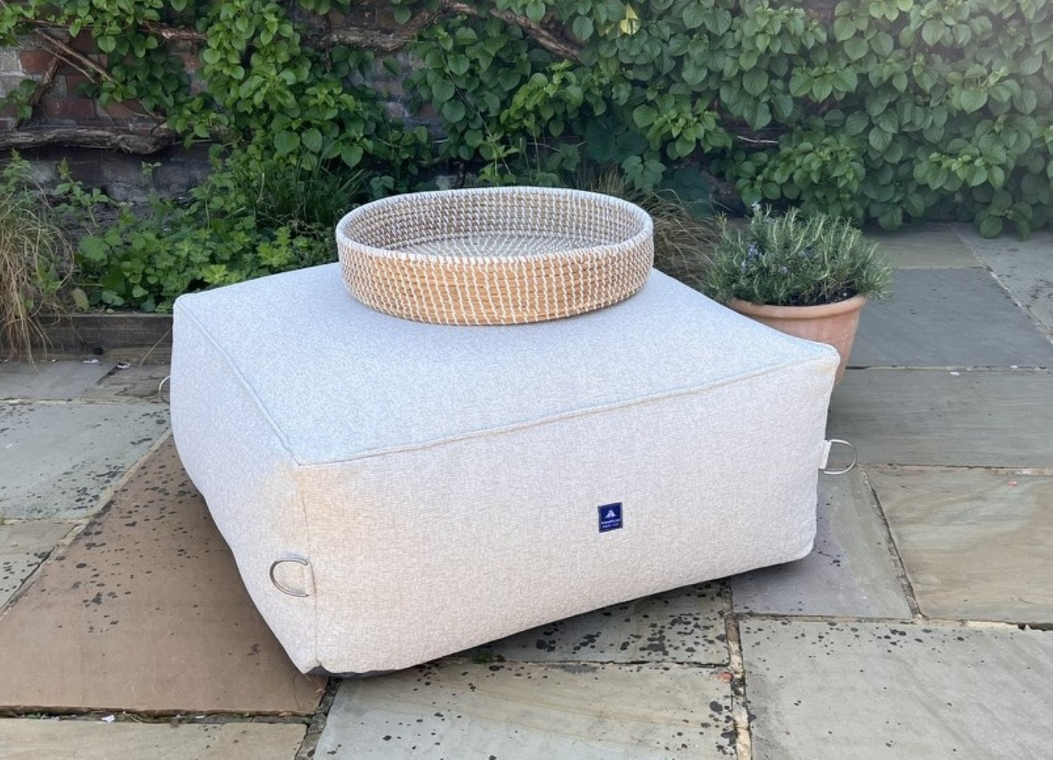 garden bean bag ottoman in shell with wooden tray. 100% british-made, stain-proof, water-resistant with 5 year guarantee