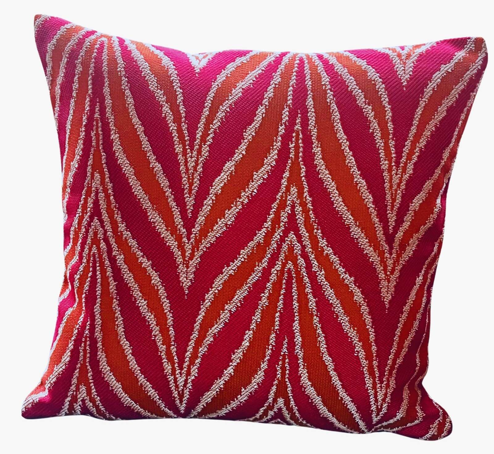 A red and orange patterned garden cushion.